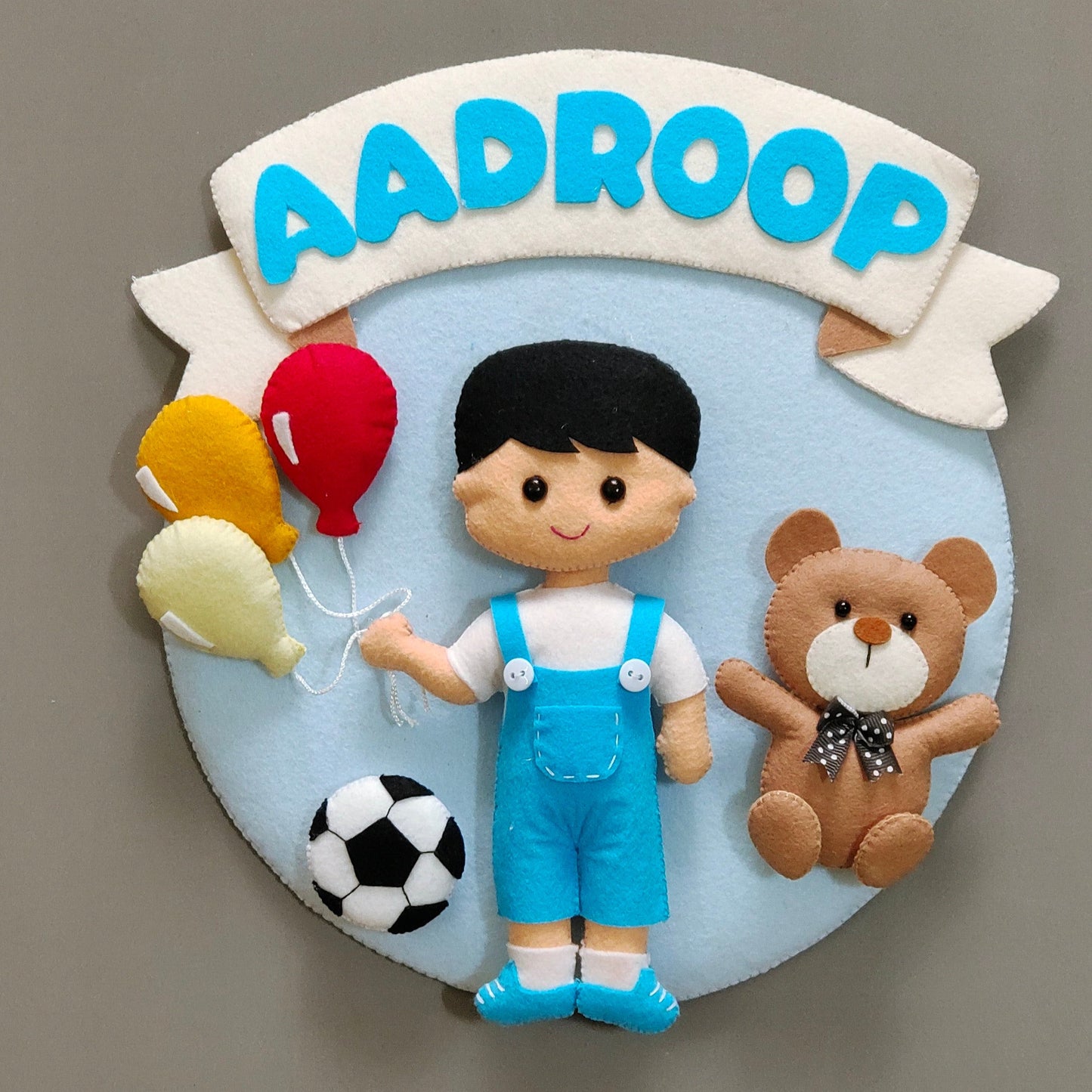 A small boy with Balloons