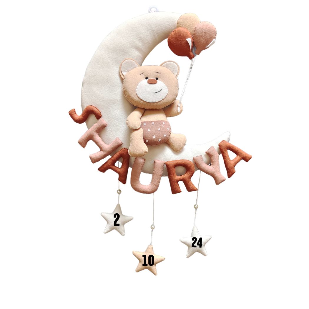 Teddy on moon with balloons