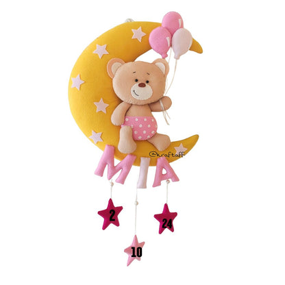 Teddy on moon with balloons