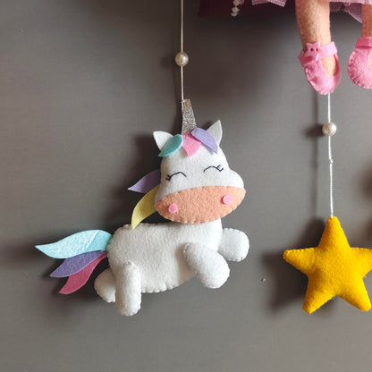 Girl on swing with Unicorn