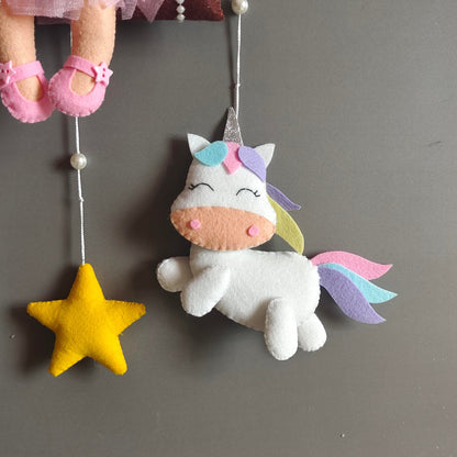 Girl on swing with Unicorn