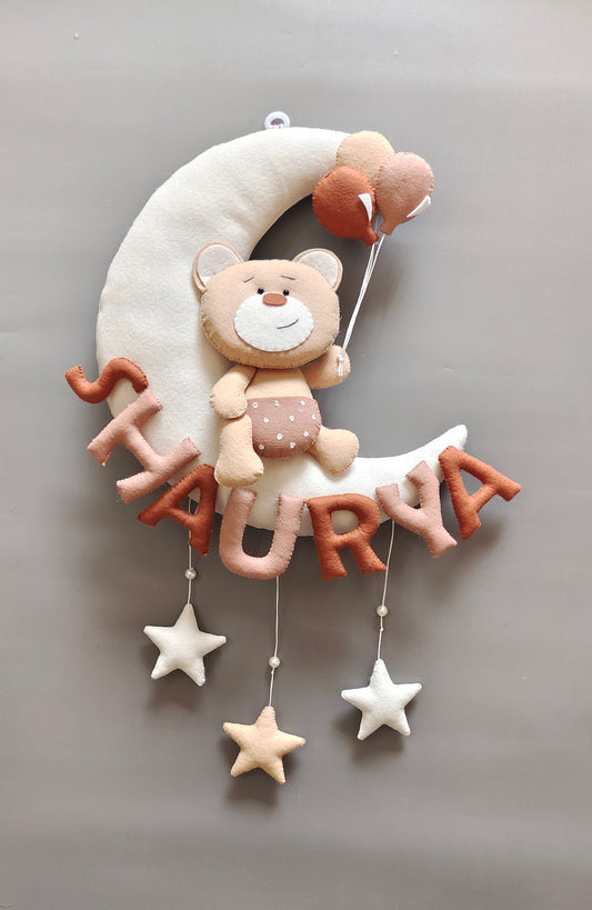 Teddy on moon with balloons