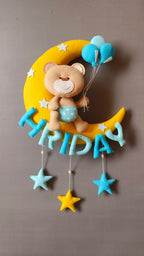 Teddy on moon with balloons