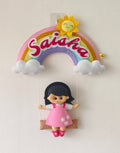 Personalised rainbow name hanging with a girl