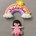 Personalised rainbow name hanging with a girl