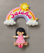 Personalised rainbow name hanging with a girl