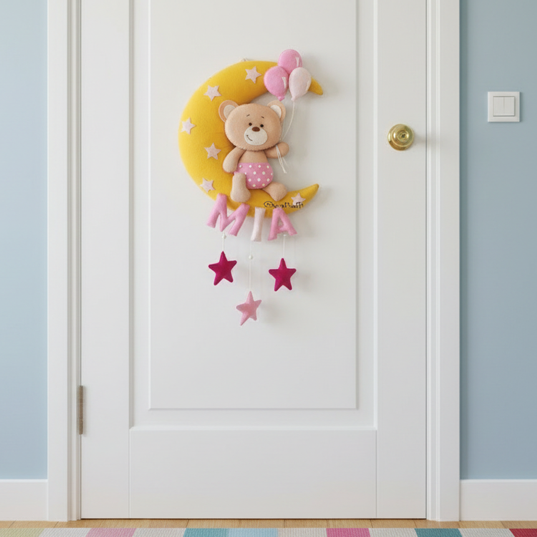 Teddy on moon with balloons