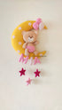 Teddy on moon with balloons